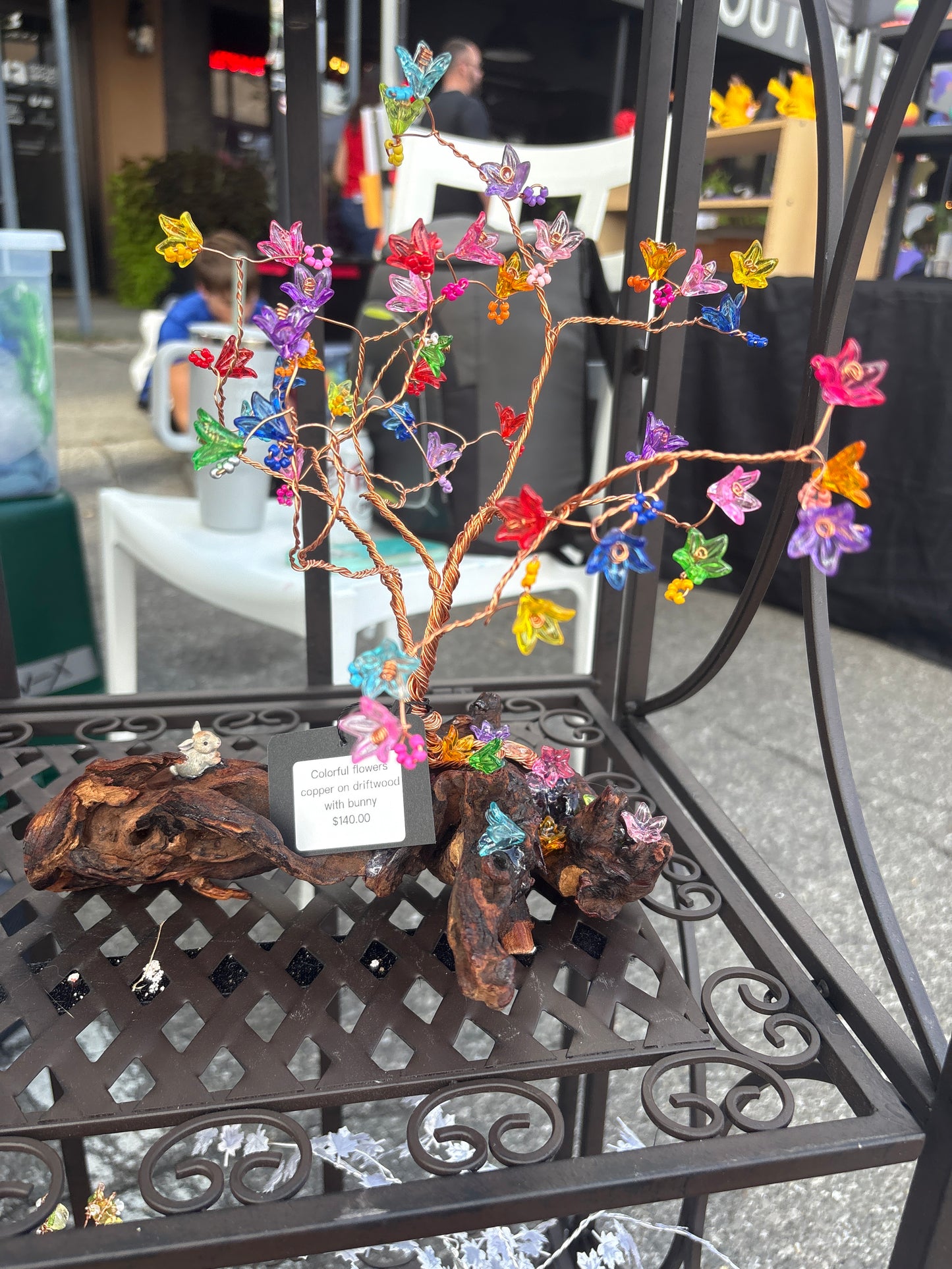 Colorful flowers on Driftwood