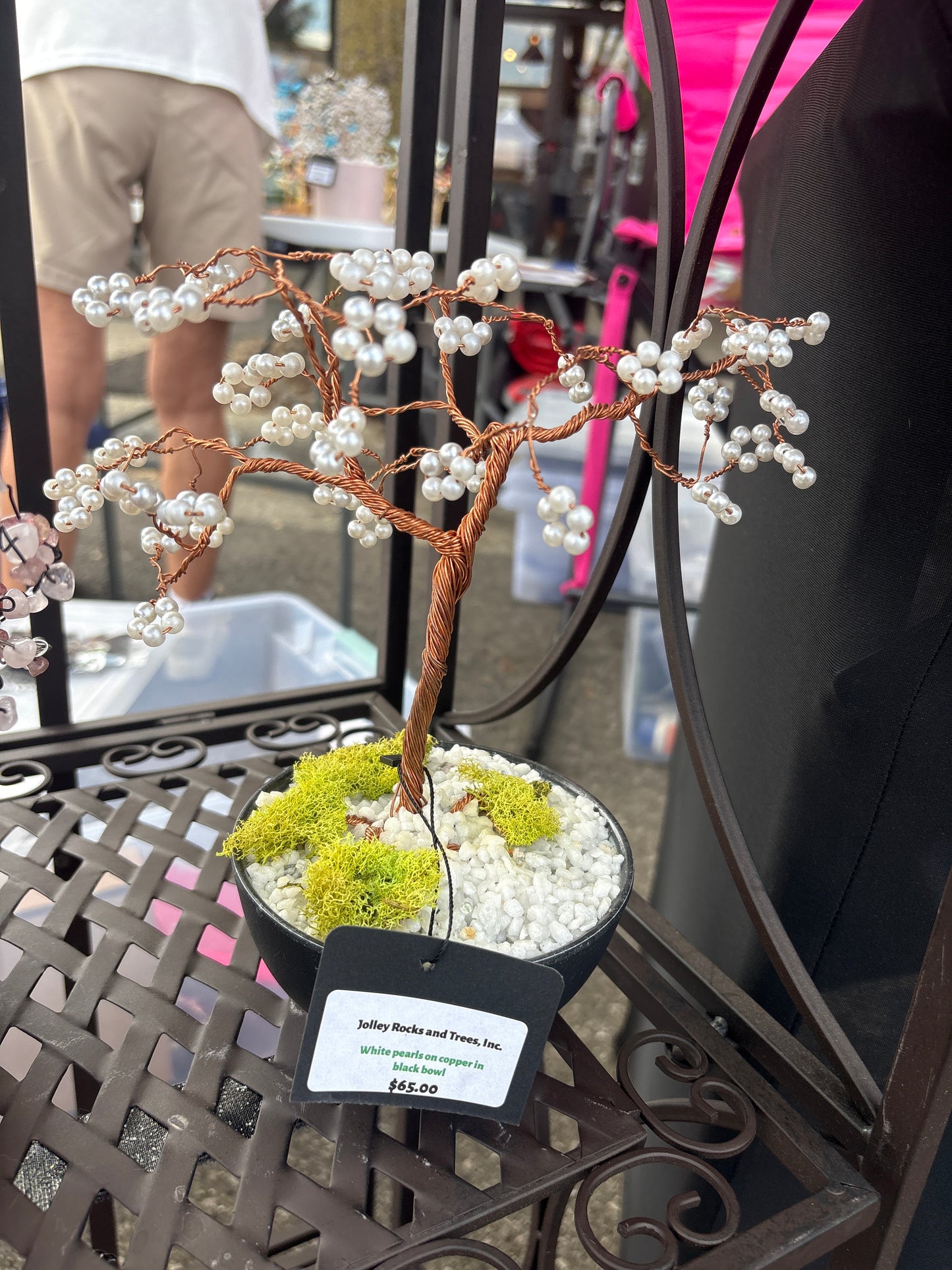 White pearls on copper