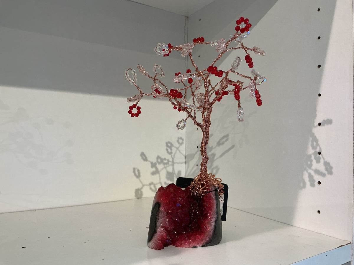 Red and white beaded on red geode